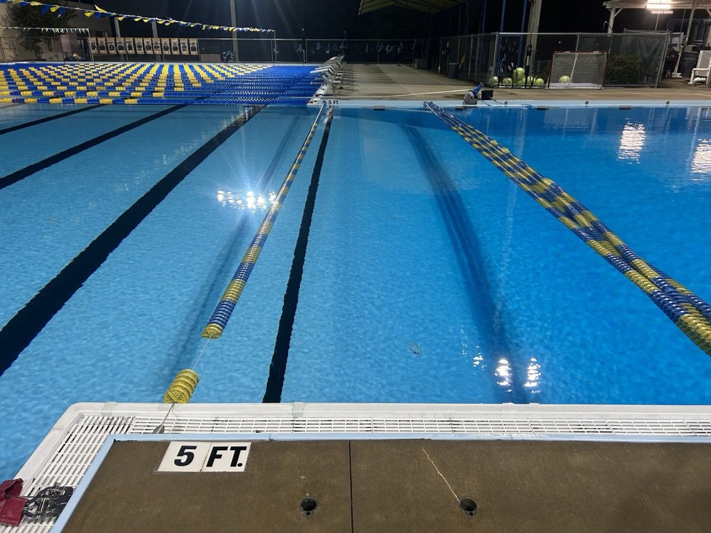 Clean commercial pool deck and water after service by Commercial Aquaworx