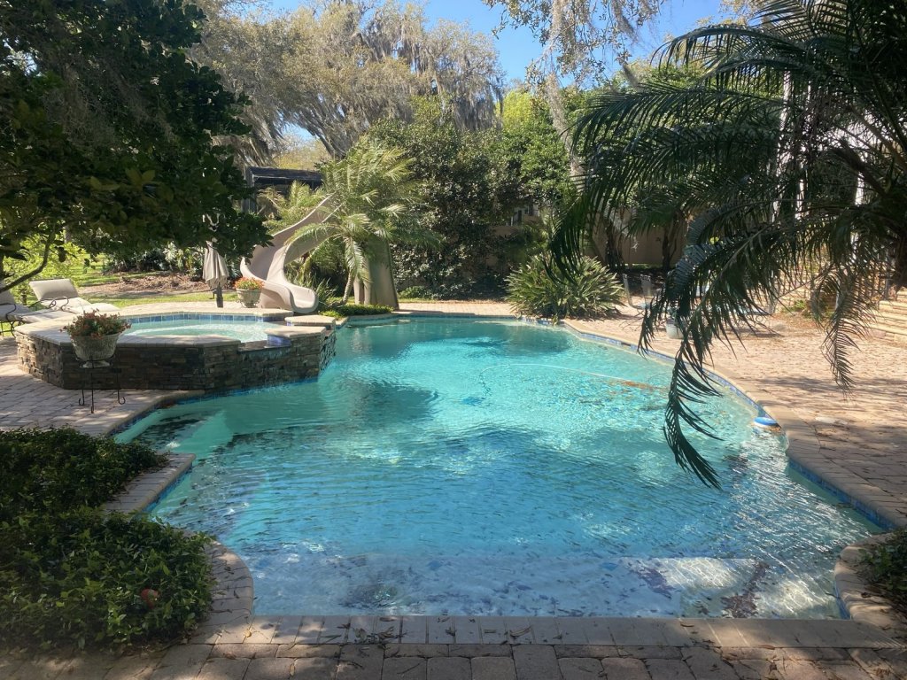 Estate swimming pool and landscaping cared for by Commercial Aquaworx